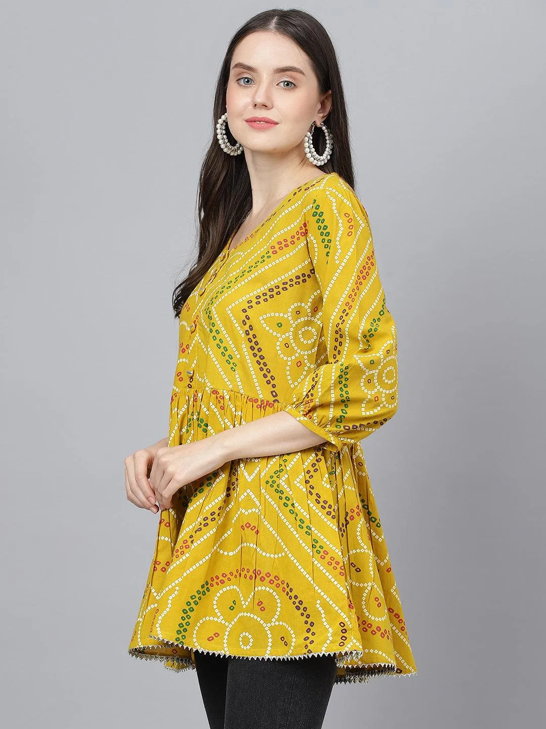 Divena Mustard Bandhani Printed Cotton Peplum Top